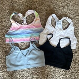 Lot of 4 girls sports bras and cropped camis